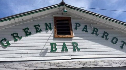 "A Sunny Place for Shady People" The Green Parrot